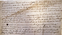 Texte manuscrit relatant la remise des armes de la baronne à la ville de Zutkerque et retranscrit ci-dessous.