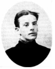 Photographie noir et blanc montrant le portrait d'un jeune homme en médaillon.